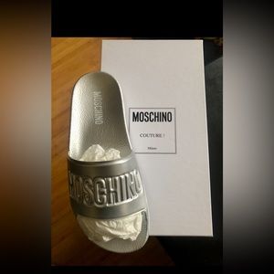 MOSCHINO Logo Embossed Pool Slide Sandals 
MSRP $175